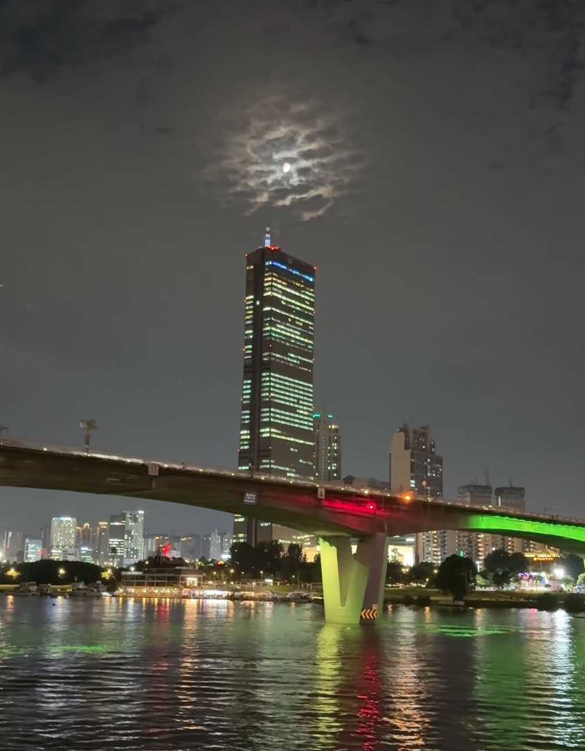 The moon above the Han River during a Moonlight Music Cruise